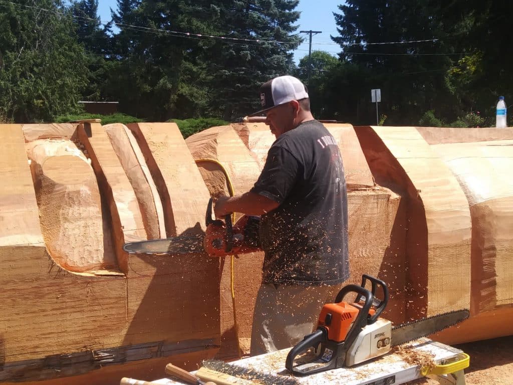 Snuneymuxw carver Noel Brown shapes the welcoming pole to be erected in the Nanaimo waterfron