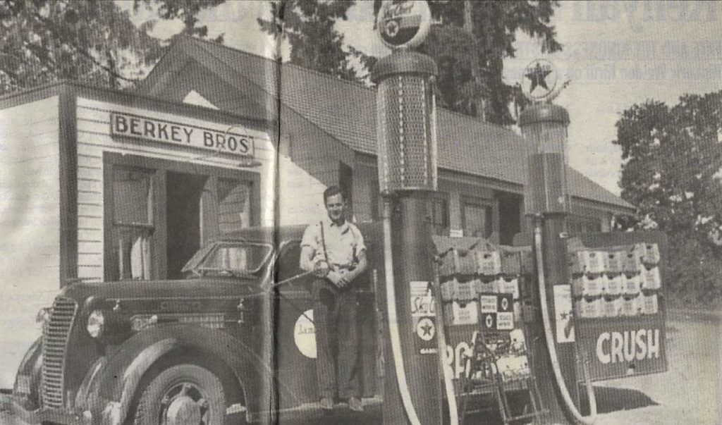 A 1941 photo of Ken Berkey accepting a soda delivery at Berkey Brothers Auto Service, printed in the Cowichan News Leader Pictorial in 2006. Photo of the news clipping sourced on Facebook.
