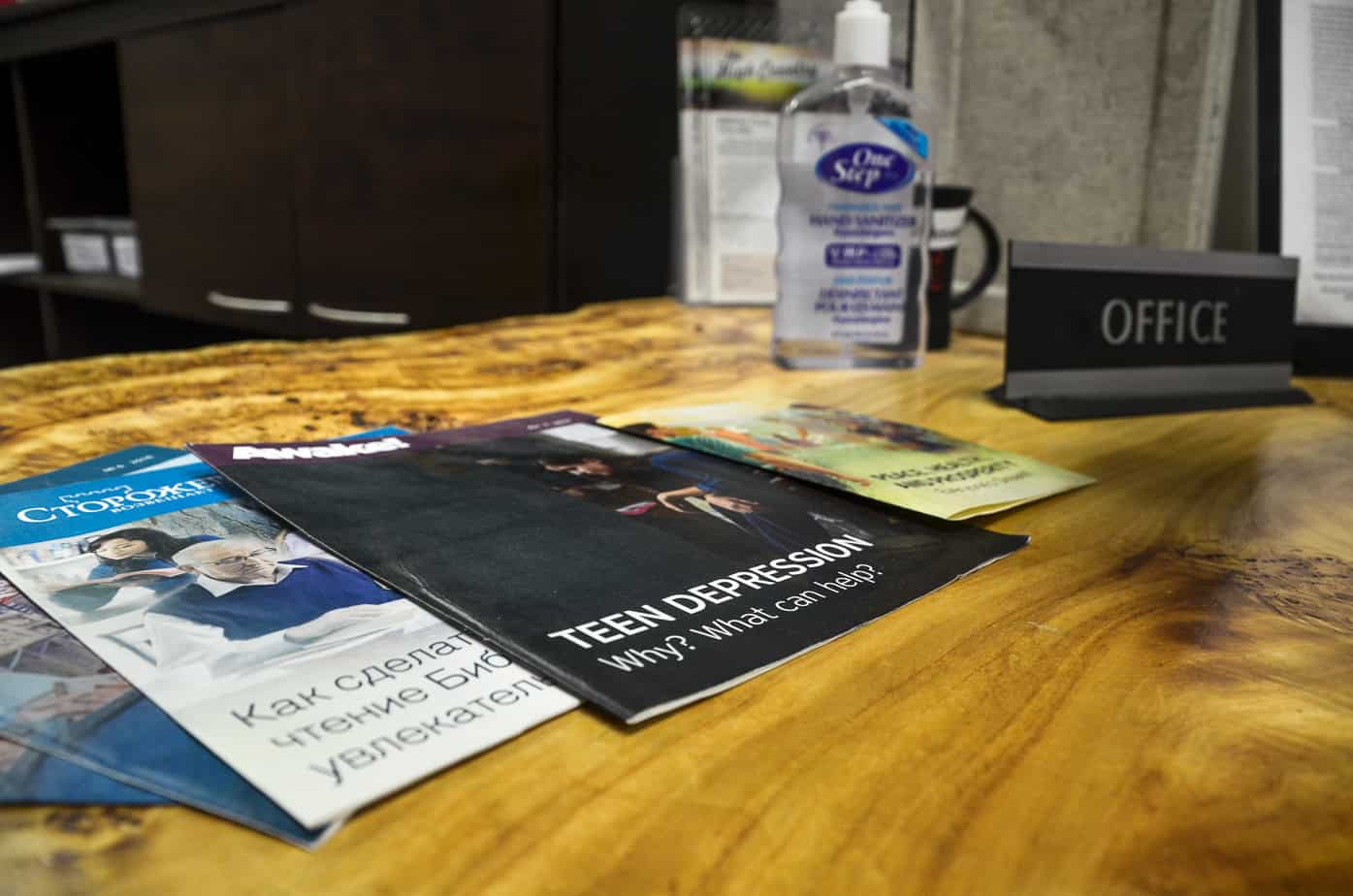 A pamphlet on depression sits at the front desk of an open camp north of Fort St. John, B.C. Francesca Fionda 