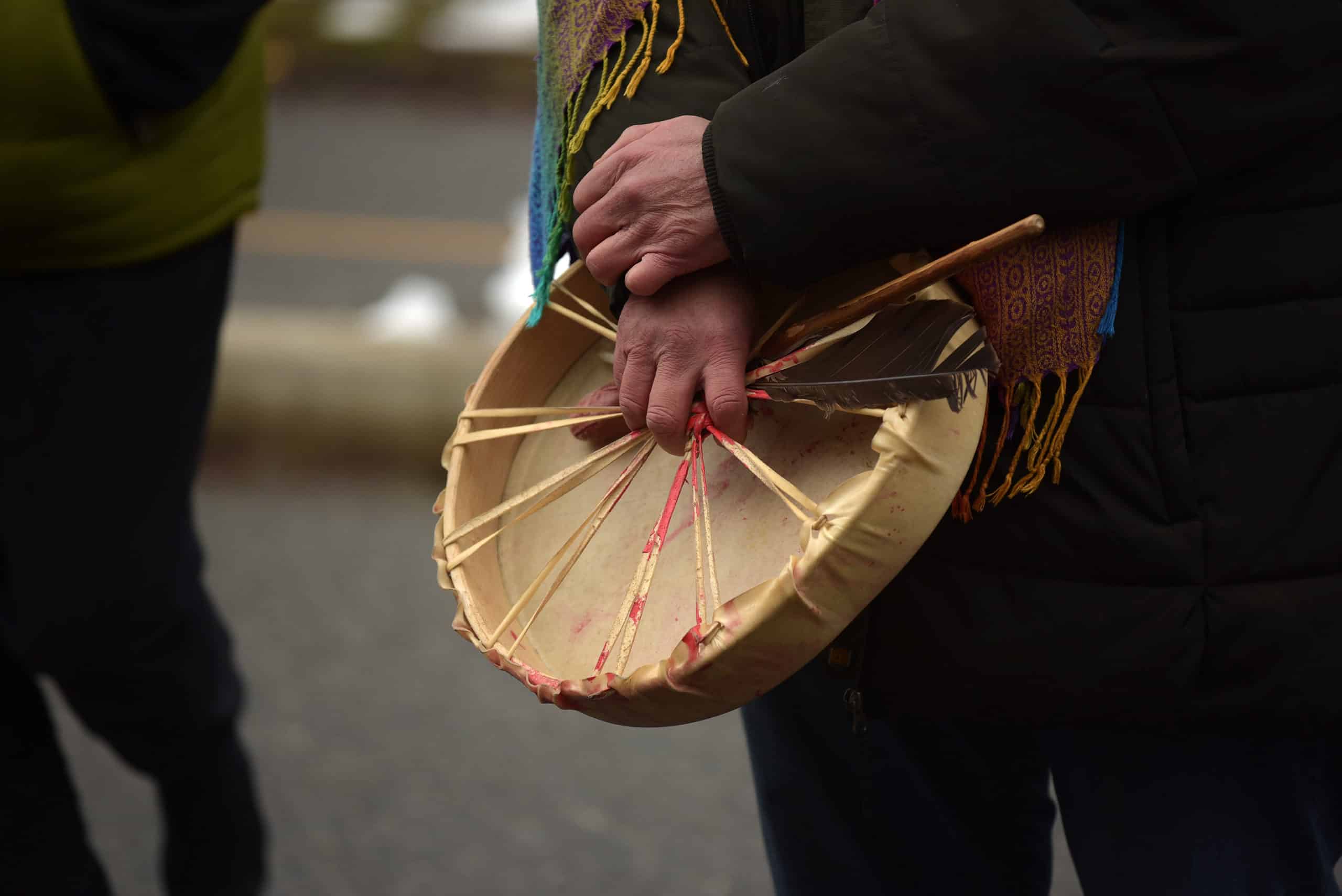 hands hold a drum