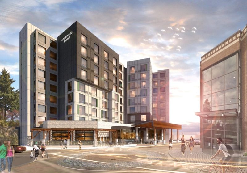 A depiction of the Nanaimo Courtyard by Marriott shows a waterview hotel and courtyard.