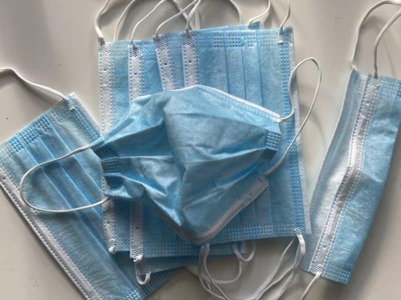 A pile of blue disposable masks, worn to prevent transmission of COVID-19.