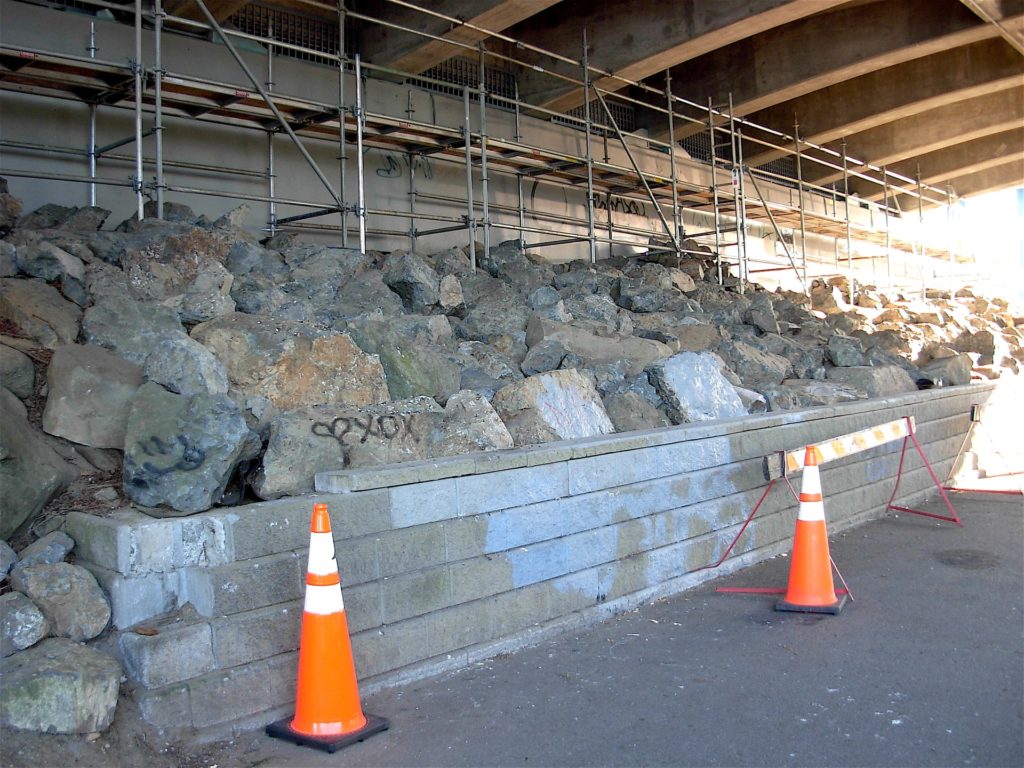 Scaffolding under Pearson Bridge is shown marked by two traffic cones.