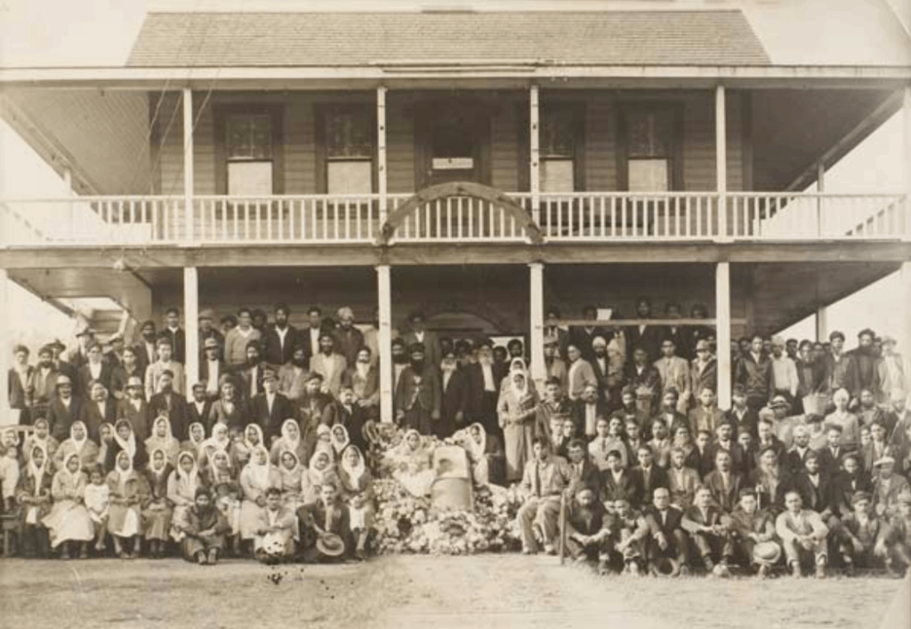 The Paldi community gathers in front of the gurdwara in 1936 for the funeral of Mayo Singh's son, who died of meningitis.