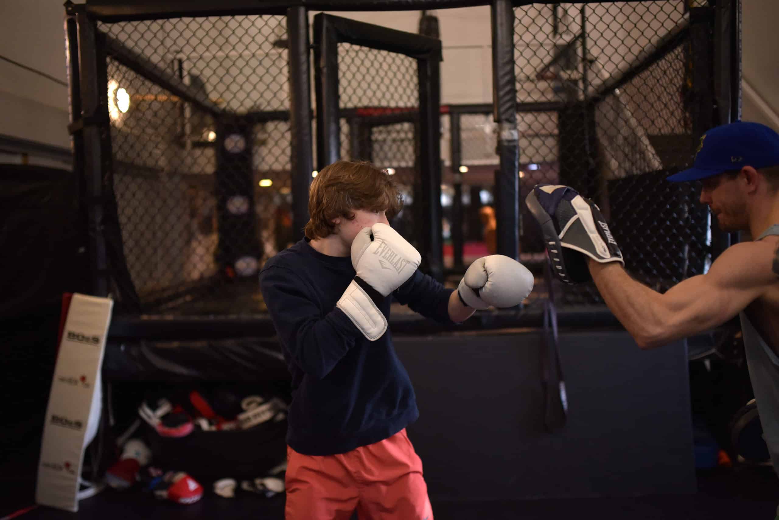 Boxing student Cody Manley trains with Shane Jung at Black Box MMA