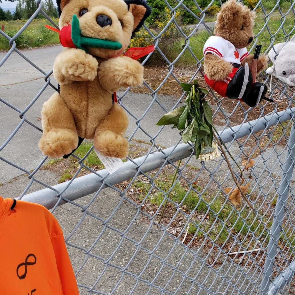 A memorial of teddy bears and orange shirts honours victims at the site of the former Nanaimo "Indian Hospital."