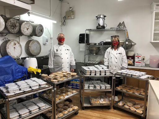 Nanaimo Legion volunteers prepare food for a Christmas fundraiser.