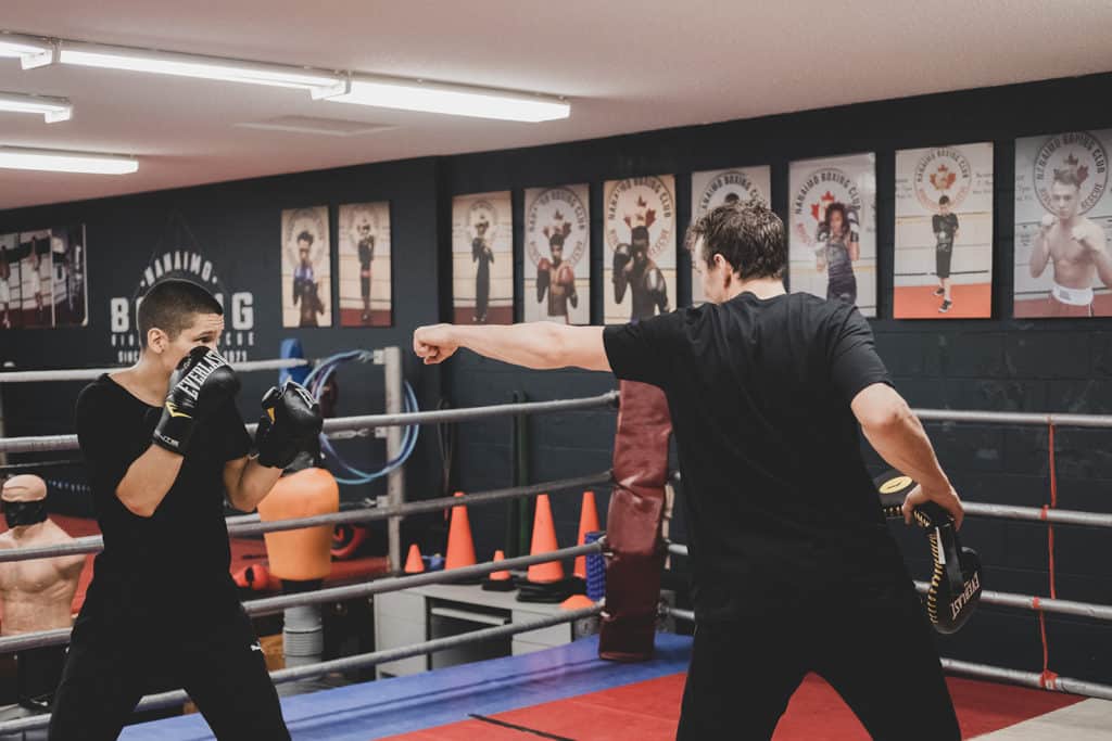 Members of Team 700 practice boxing drills. 