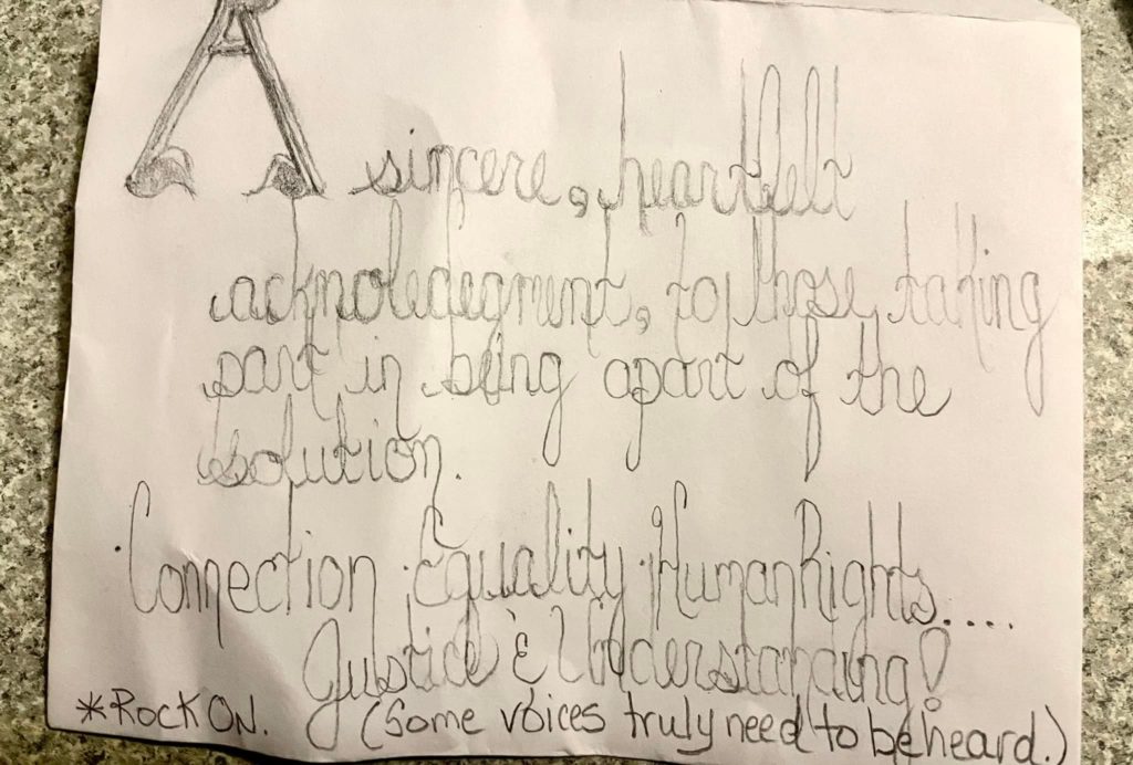 A note left behind on one of the tables at RISEBRIDGE's indoor warming centre, Warmreach reads "A sincere, heartfelt acknowledgement to those taking part in being a part of the solution. Connection, equality, human rights, justice and understanding. Rock on. (Some voices truly need to be heard)."