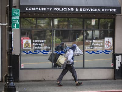A person walks by the community policing office in Nanaimo