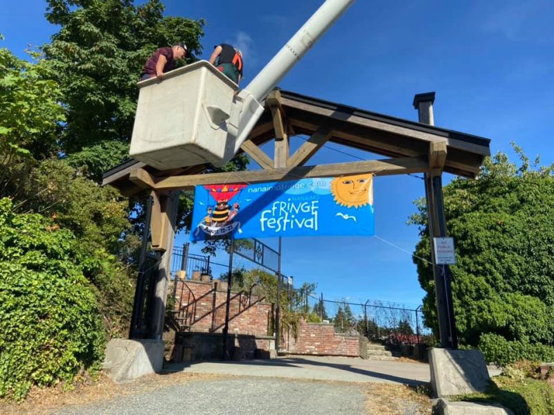 The Nanaimo Fringe Festival banner is installed in the lead up to the 2021 festival.