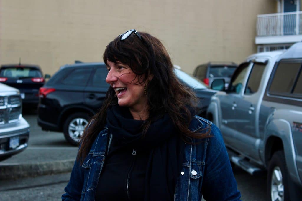 Candid shot of a woman smiling.