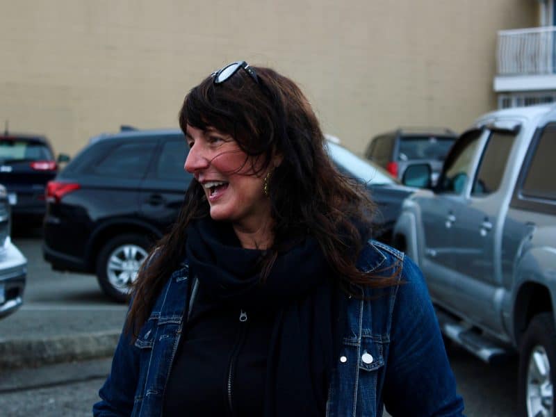 Candid shot of a woman smiling.