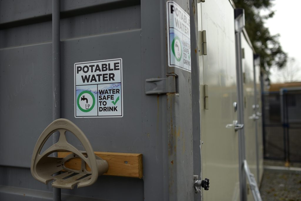 A container with a potable water sign on it.